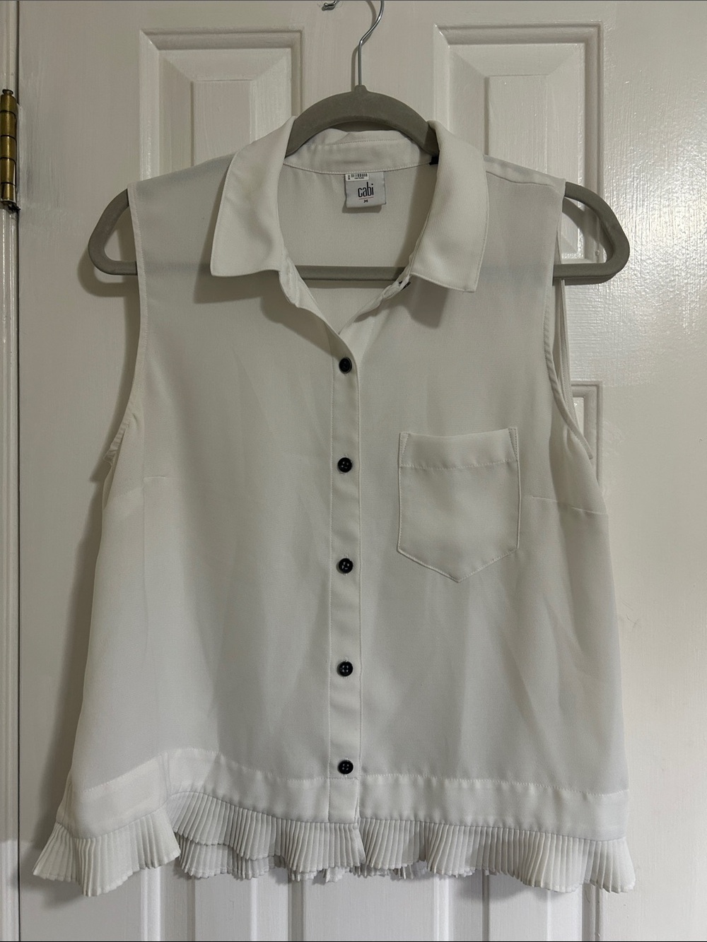 Cabi: Sleeveless Button-Front Ruffle Hem Top — White, M